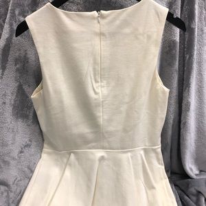 Peplum sleeveless top
